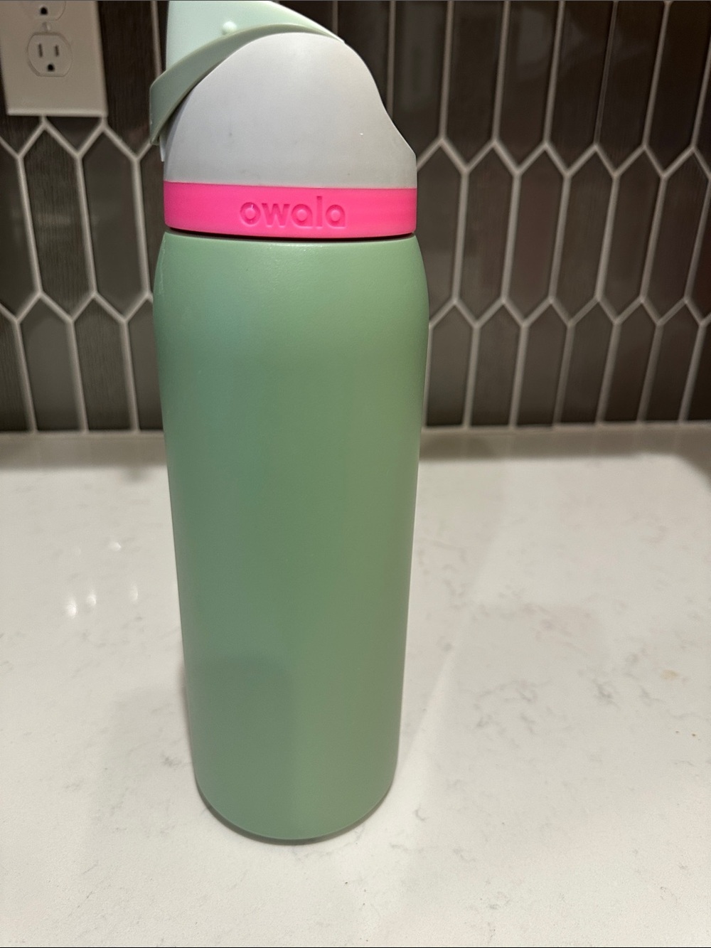 Owala Green Water Bottle with Pink Accent